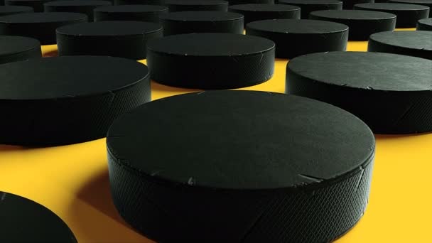 Vele rijen van zwarte hockey pucks zijn op het oppervlak, sportieve computergegenereerde achtergrond, 3d render — Stockvideo