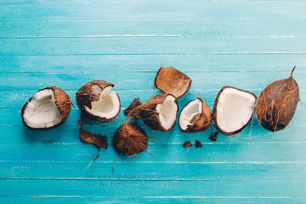 coconut, blue, background, fruit, food, fresh, healthy, wooden, oil, tropical, exotic, coco, white, diet, nut, natural, nature, table, half, top, isolated, organic, nutrition, space, milk, copy, concept