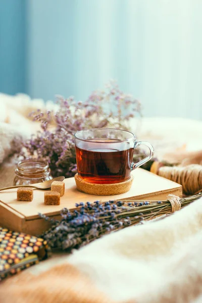 A cup of tea on the bed, home comfort, cozy, lifestyle