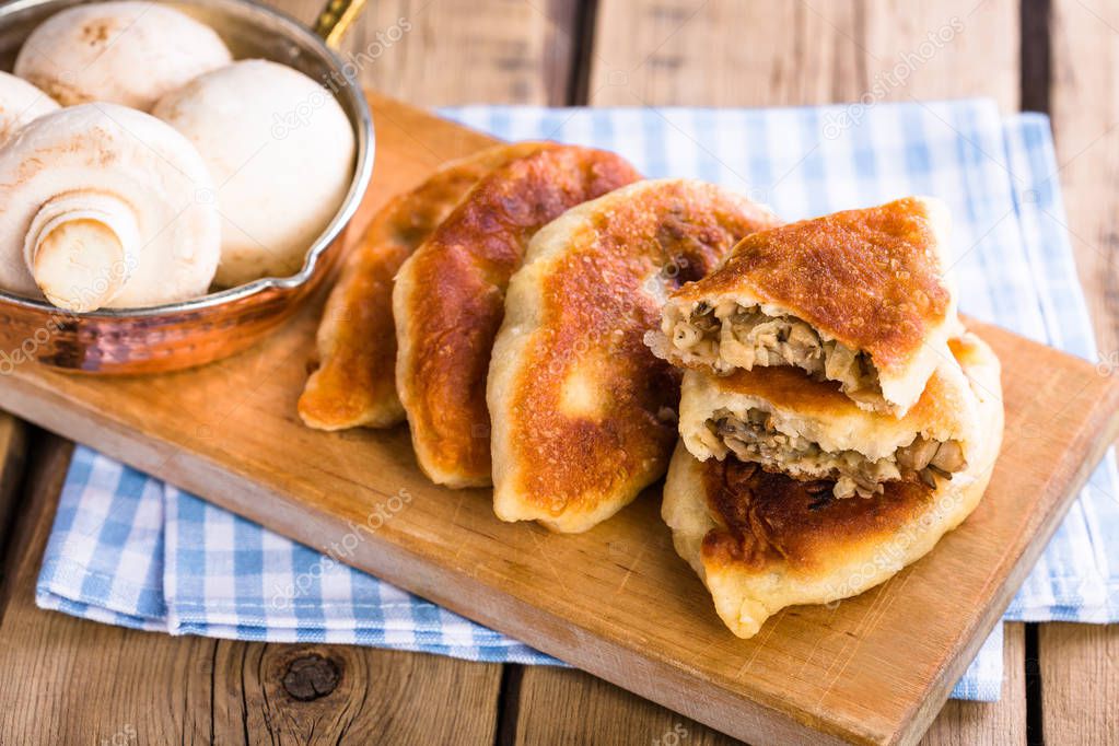 Homemade fried mushroom patties, rustic style, vintage, wooden background