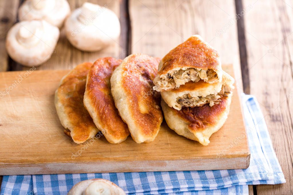 Homemade fried mushroom patties, rustic style, vintage, wooden background