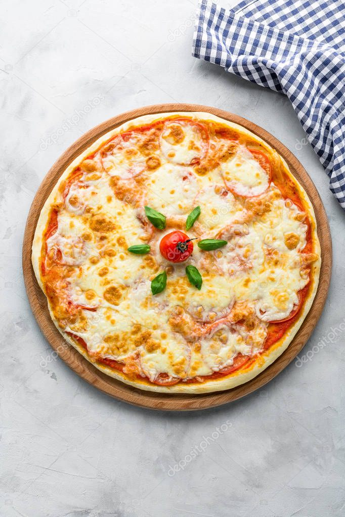 pizza, stone background gray color, top view, vertical shot, checkered napkin, restaurant menu, Italian cuisine