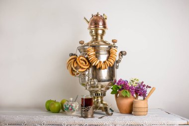Tula samovar, tea with donuts, still life in Russian style clipart