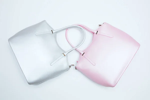 white and pink bag