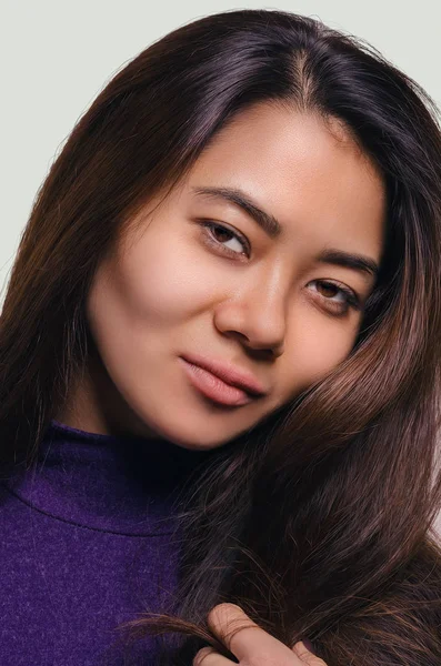 Asian girl portrait. Beautiful  woman. Studio shoot. Natural beauty.