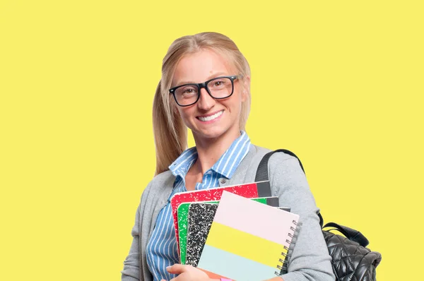 Feliz Joven Estudiante Sosteniendo Libros Bachillerato Graduado Universidad Fondo Amarillo —  Fotos de Stock