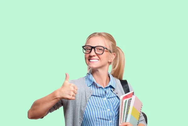 Feliz Joven Estudiante Sosteniendo Libros Escuela Secundaria Graduado Universidad Fondo — Foto de Stock