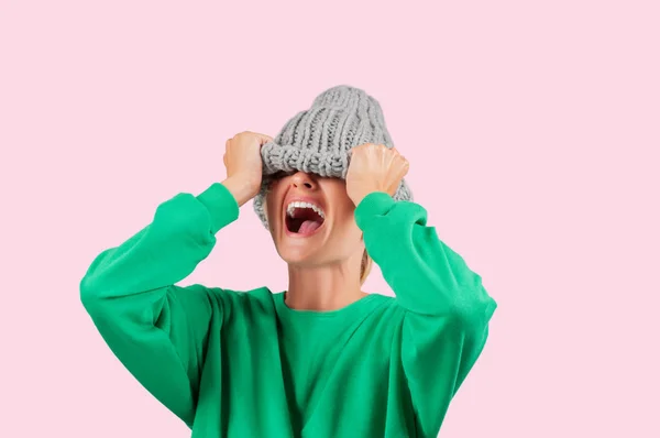 Furious Emotional Angry Woman Pulling Wool Hat Her Eyes Pink — Stock Photo, Image