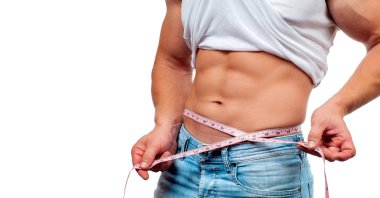  Kaslı adam onun bel ölçüm kusursuz bir beden ile. Adam kas gövde ve altı paketi