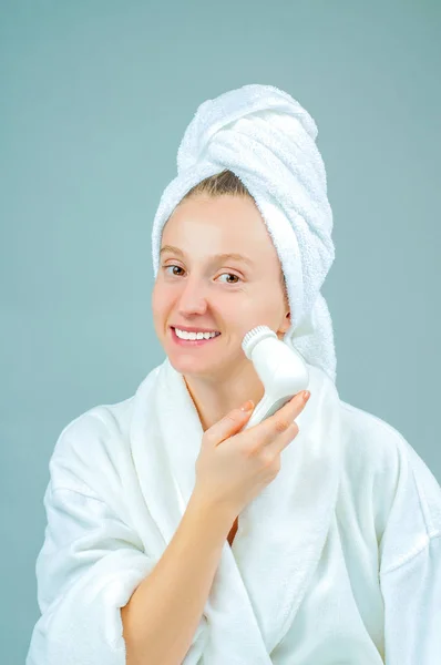 Facial care. Perfect fresh clean skin concept. Young beautiful woman washing her face.
