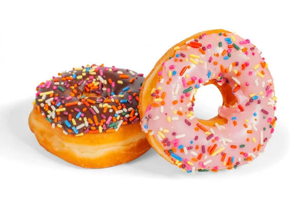 Kleurrijke geglazuurde donuts op witte achtergrond. — Stockfoto