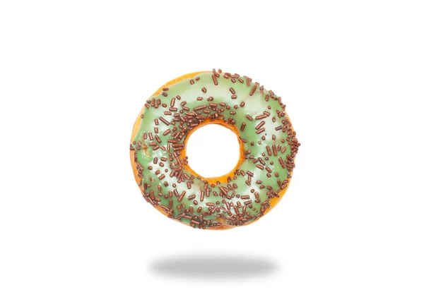 Grüner Donut auf weißem Hintergrund. — Stockfoto