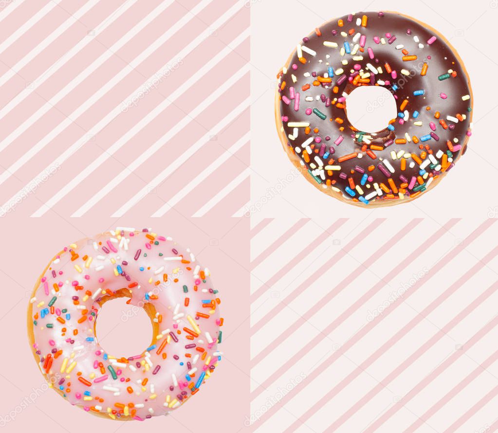 Colorful donuts on pastel pink background.
