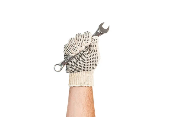 Tool. Hand in glove is holding wrench on white background. — Stock Photo, Image