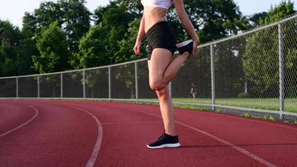 Athletic Woman Stretching Legs Run Running Track — Stock Video