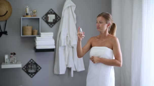 Skin Care Beautiful Woman Wrapped Towel Shower Spraying Micellar Water — Stockvideo