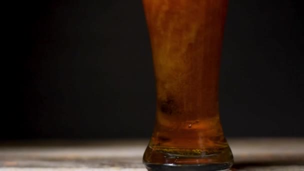 Beer Foam Pouring Edge Closeup Glass Cold Beer Black Background — Stock Video