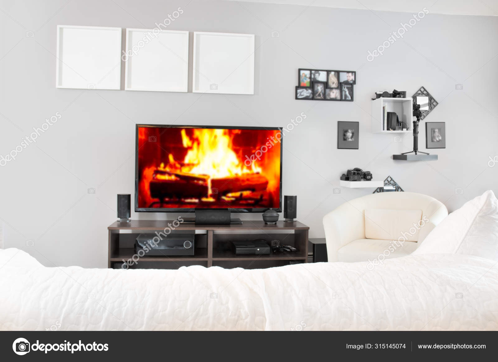Cozy Interior Of Living Room With Tv Fireplace On Television