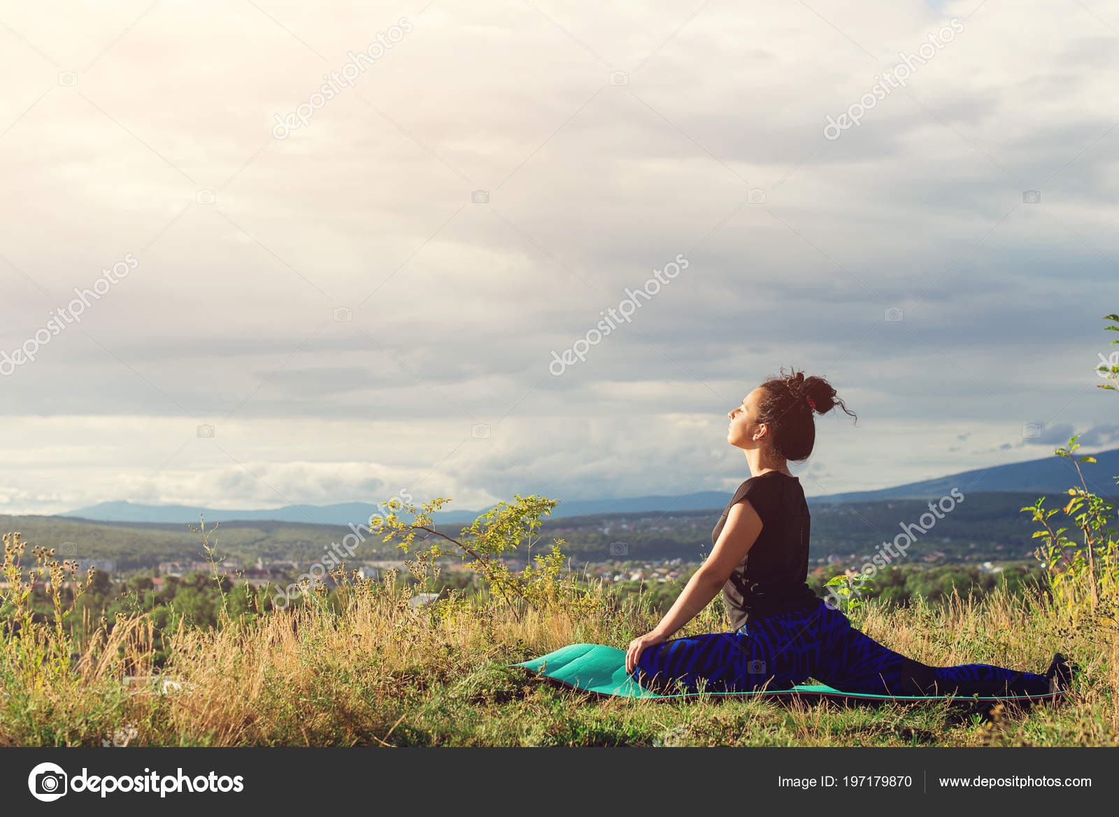 Young beautiful woman doing yoga in nature stock photo (183937) -  YouWorkForThem