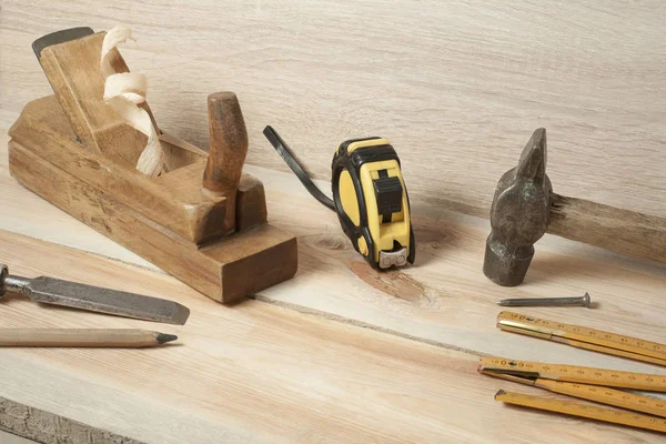 Carpentry concept.Joiner carpenter workplace. Different tools on wooden table. Copy space for text. — Stock Photo, Image