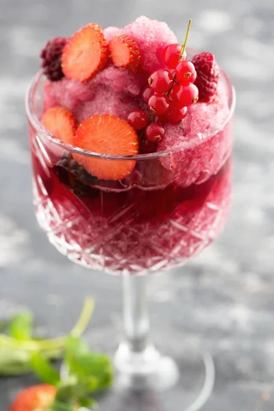 Berry frozen drink close up isolated. Copy space available.