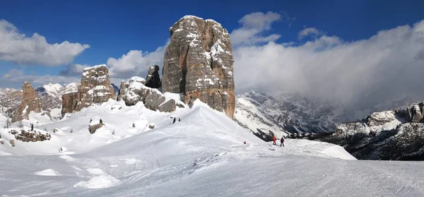 The beautiful group of the five towers (Cinque Torri) in the Dolomites in winter. The Cinque Torri is a small mountain complex that is part of the Nuvolau group, near Cortina d\'Ampezzo. Italy.
