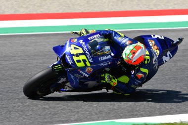 MUGELLO - ITALY, 2 JUNE: Italian Yamaha Movistar Team rider Valentino Rossi set Pole Position during Qualifyng session at 2018 GP of Italy of MotoGP on 2 June, 2018. Italy clipart