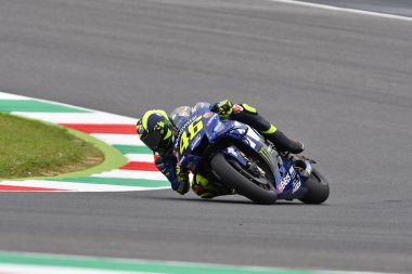 MUGELLO - ITALY, JUNE: Italian Yamaha Movistar Team rider Valentino Rossi at 2018 GP of Italy of MotoGP on June, 2018. Italy clipart