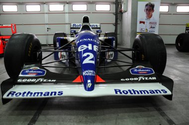 Imola, 27 April 2019: Historic 1994 F1 Williams FW16 ex Ayrton Senna - Damon Hill in the box during Minardi Historic Day 2019 at Imola Circuit in Italy. clipart