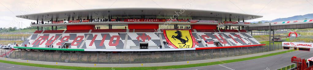 MUGELLO, ITALY - MAY 2012: view of the central tribune at Mugello Circuit during the Official F1 Test Days with the giant logo of Ferrari. Italy