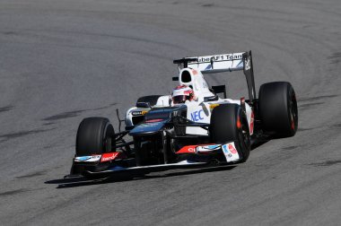 MUGELLO, ITALY - MAYIS 2012: Sauber F1 Team takımından Kamui Kobayashi İtalya 'nın Mugello pistinde antrenman yapıyor..