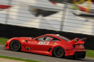 MUGELLO, ITALY - NOVEMBER, 2013: Bilinmeyen Ferrari 599XX EVO 'yu Finali Mondiali Ferrari' nin XX Programları sırasında kullanıyor - Ferrari Mugello Pisti 'nde Yarış Günleri.