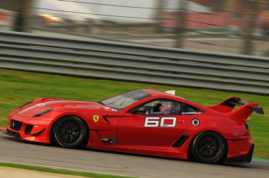 MUGELLO, ITALY - NOVEMBER, 2013: Bilinmeyen Ferrari 599XX EVO 'yu Finali Mondiali Ferrari' nin XX Programları sırasında kullanıyor - Ferrari Mugello Pisti 'nde Yarış Günleri.