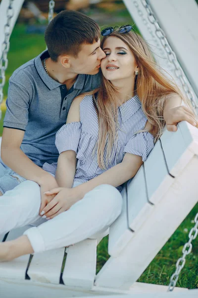 Couple on a swing — Stock Photo, Image