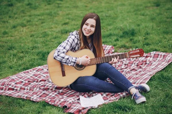 Girl with a guitar — Stock Photo, Image