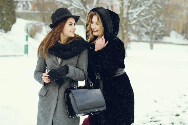 Girls and snow — Stock Photo, Image