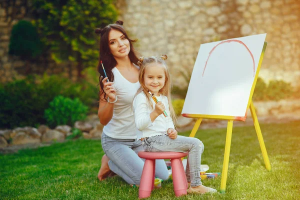 Mother and daughter drawing