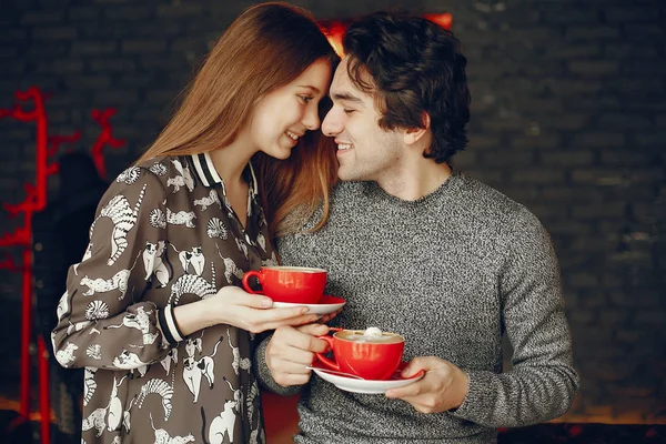 Cute couple spend time in a cafe