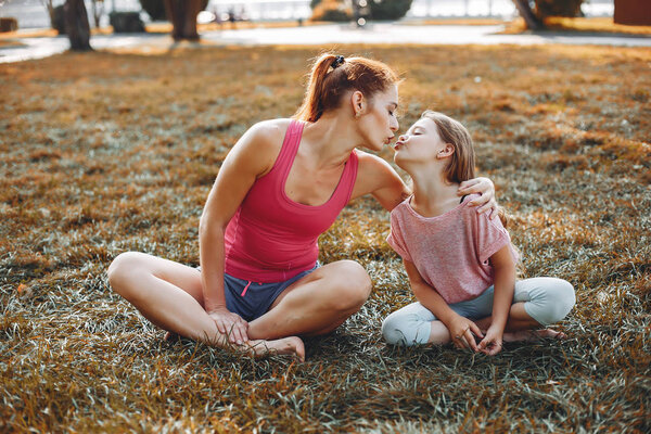Sports family in a summer park