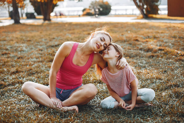 Sports family in a summer park