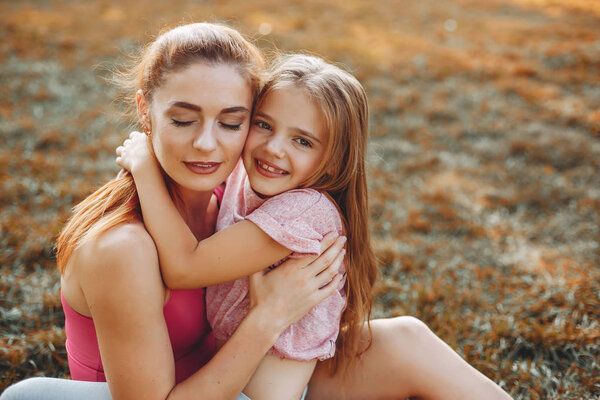 Sports family in a summer park