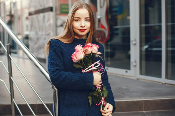 Girl with flowers — Stock Photo, Image