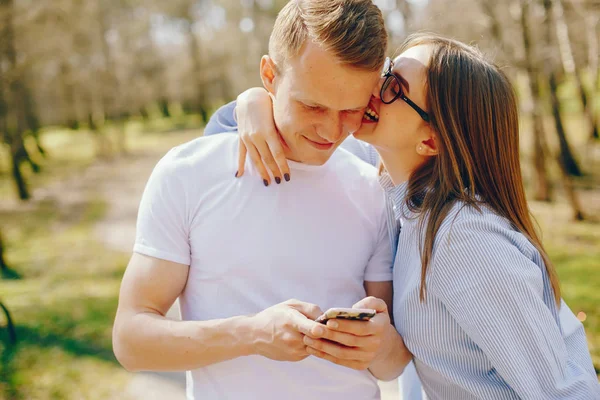 Cute couple in a forest — Stock Photo, Image