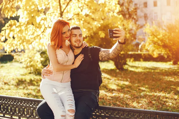 Couple in a park — Stock Photo, Image