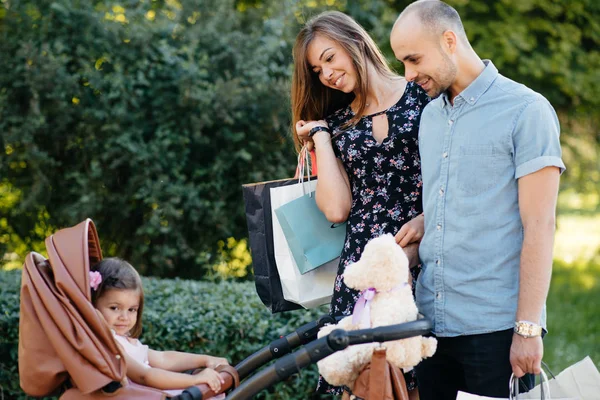 Family with shopping bag in a city