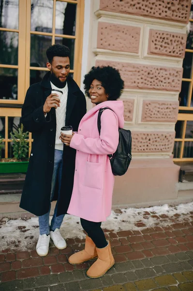 Black couple in a city