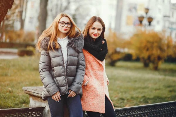 Beautiful girls in a park — Stock Photo, Image