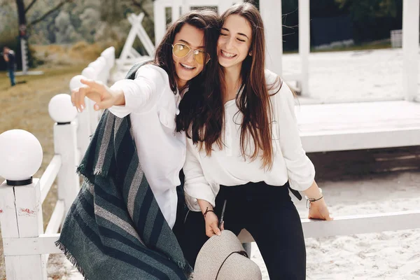 Two pretty girls in a summer park — Stock Photo, Image