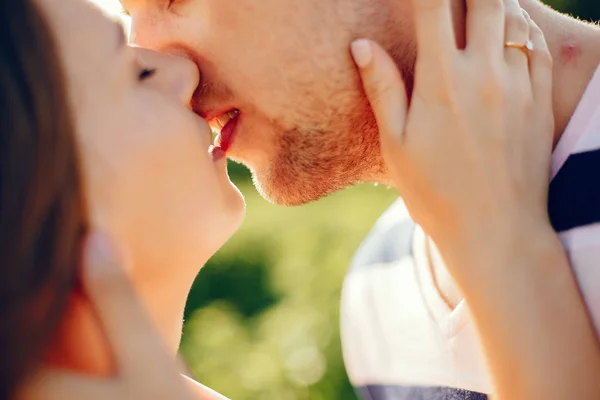 Beautiful couple spend time on a summer field — Stock Photo, Image