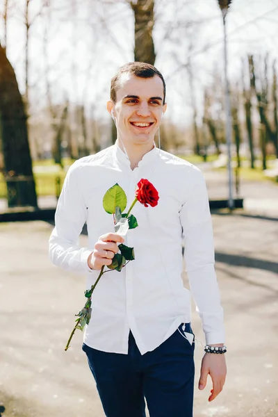 young man with rose